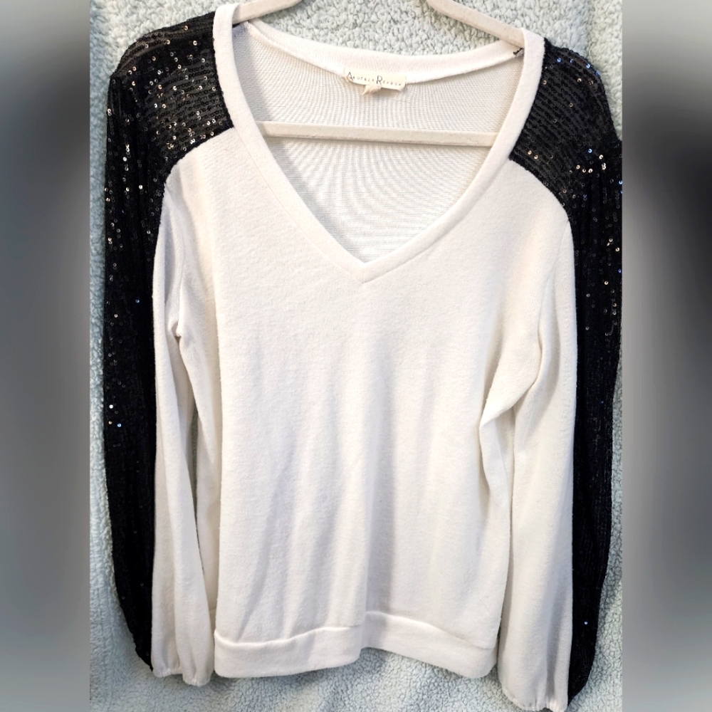 Women's soft sweatshirt style top with 1/2 sequin sleeves